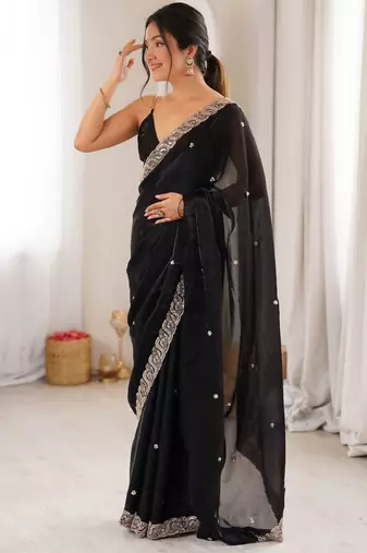 Black tissue satin embroidered saree with unstitched blouse piece.