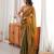 Gold tissue satin embroidered saree with unstitched blouse piece.
