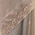 Grey tissue satin embroidered saree with unstitched blouse piece.