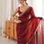 Maroon tissue satin embroidered saree with unstitched blouse piece.