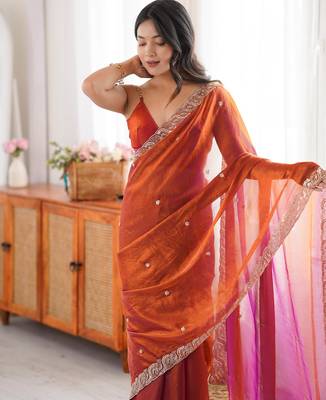 Orange tissue satin embroidered saree with unstitched blouse piece. 1