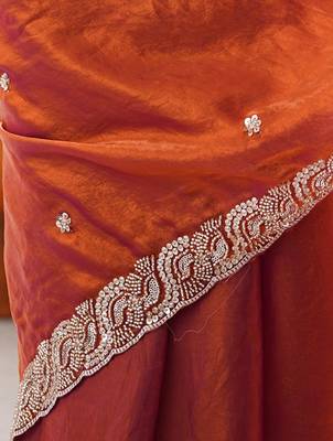 Orange tissue satin embroidered saree with unstitched blouse piece. 4