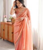Peach tissue satin embroidered saree with unstitched blouse piece.