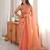 Peach tissue satin embroidered saree with unstitched blouse piece.