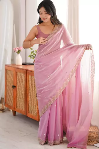 Pink tissue satin embroidered saree with unstitched blouse piece.