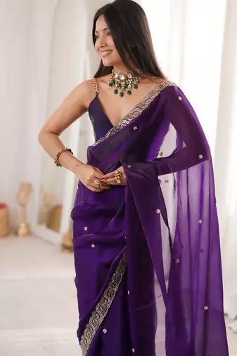 Purple tissue satin embroidered saree with unstitched blouse piece.