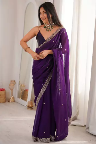Purple tissue satin embroidered saree with unstitched blouse piece.