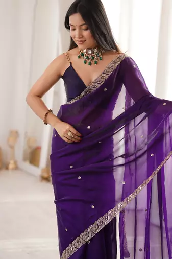 Purple tissue satin embroidered saree with unstitched blouse piece.