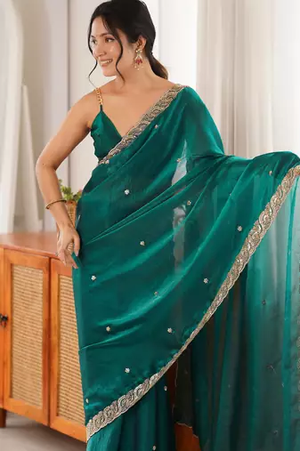 Rama tissue satin embroidered saree with unstitched blouse piece.
