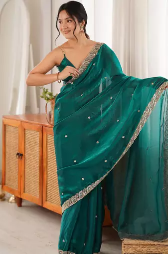 Rama tissue satin embroidered saree with unstitched blouse piece.