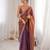 Rust tissue satin embroidered saree with unstitched blouse piece.