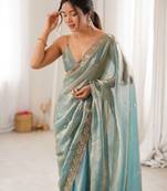 Sky blue tissue satin embroidered saree with unstitched blouse piece.