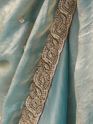 Sky blue tissue satin embroidered saree with unstitched blouse piece. 3