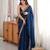Teal tissue satin embroidered saree with unstitched blouse piece.