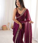 Wine tissue satin embroidered saree with unstitched blouse piece.