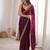 Wine tissue satin embroidered saree with unstitched blouse piece.