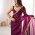 Wine tissue satin embroidered saree with unstitched blouse piece.