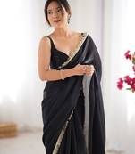 Black tissue satin sequins saree with unstitched blouse piece.