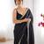 Black tissue satin sequins saree with unstitched blouse piece.
