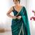 Green tissue satin sequins saree with unstitched blouse piece.