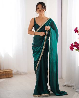 Green tissue satin sequins saree with unstitched blouse piece. 2