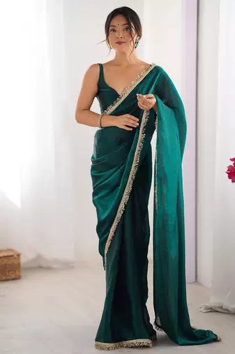 Green tissue satin sequins saree with unstitched blouse piece.