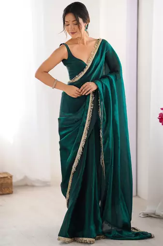 Green tissue satin sequins saree with unstitched blouse piece.