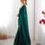 Green tissue satin sequins saree with unstitched blouse piece.