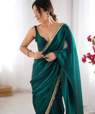 Green tissue satin sequins saree with unstitched blouse piece. 5