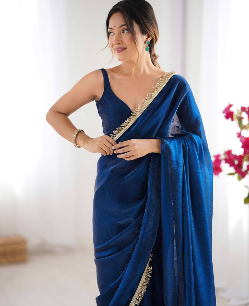 Navy blue tissue satin sequins saree with unstitched blouse piece.