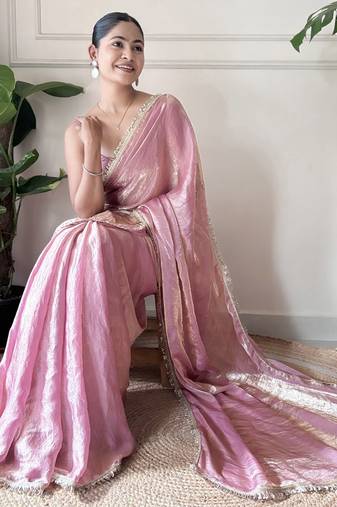 Onion tissue satin sequins saree with unstitched blouse piece.