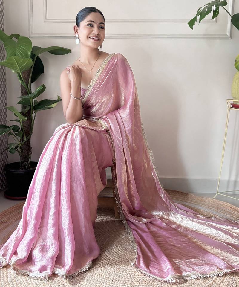 Onion tissue satin sequins saree with unstitched blouse piece.