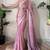 Onion tissue satin sequins saree with unstitched blouse piece.