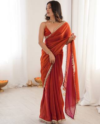 Orange tissue satin sequins saree with unstitched blouse piece. 2
