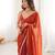 Orange tissue satin sequins saree with unstitched blouse piece.