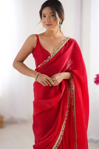 Red tissue satin sequins saree with unstitched blouse piece.