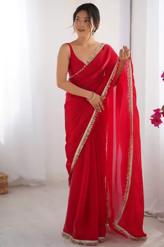 Red tissue satin sequins saree with unstitched blouse piece.