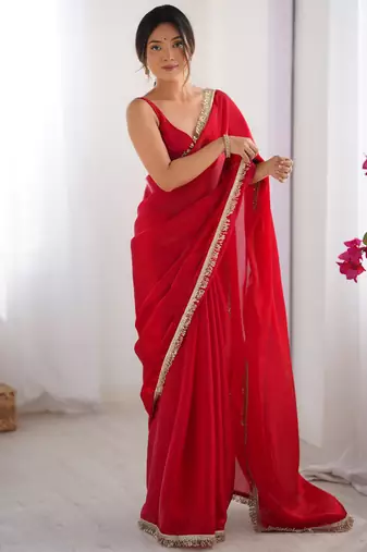 Red tissue satin sequins saree with unstitched blouse piece.