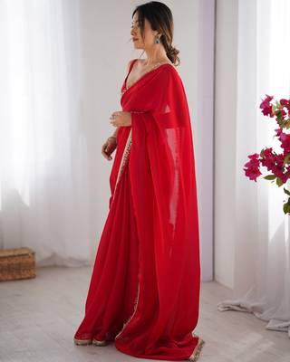 Red tissue satin sequins saree with unstitched blouse piece. 5