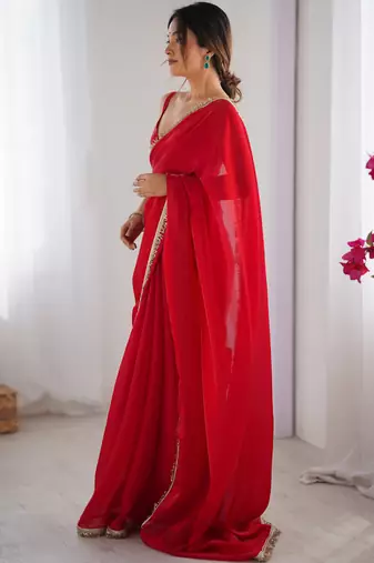 Red tissue satin sequins saree with unstitched blouse piece.