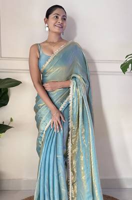 Sky blue tissue satin sequins saree with unstitched blouse piece. 3