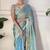 Sky blue tissue satin sequins saree with unstitched blouse piece.