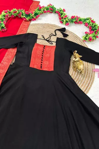 black color rich red-gold zari border with traditional motifs silk blend gown set