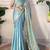 Sky blue tissue satin sequins saree with unstitched blouse piece.