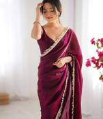 Wine tissue satin sequins saree with unstitched blouse piece.