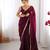 Wine tissue satin sequins saree with unstitched blouse piece.