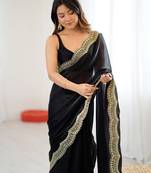 Black tissue satin sequins saree with unstitched blouse piece.