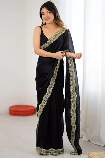 Black tissue satin sequins saree with unstitched blouse piece.