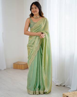 Green tissue satin sequins saree with unstitched blouse piece. 3