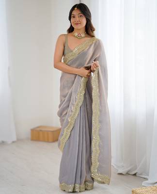 Grey tissue satin sequins saree with unstitched blouse piece. 2